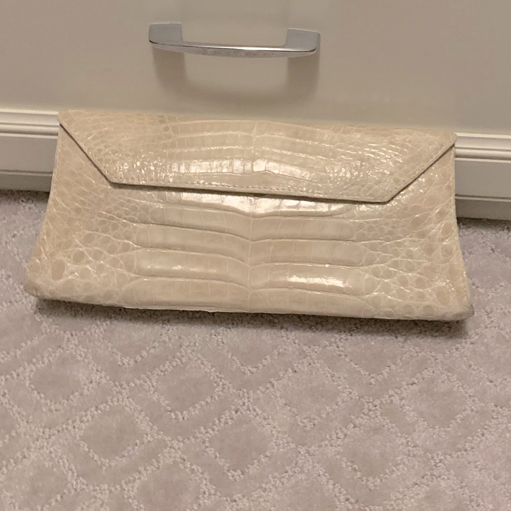 Nancy Gonzalez genuine crocodile clutch.